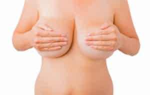 chubby woman's torso cupping her breasts